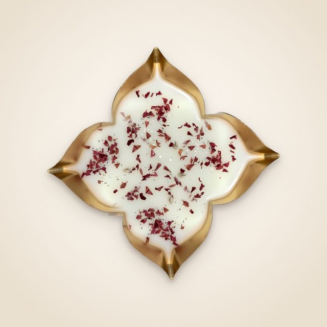 DH-12: Rose petals set in white wax, in a four-point gold metal tray.
